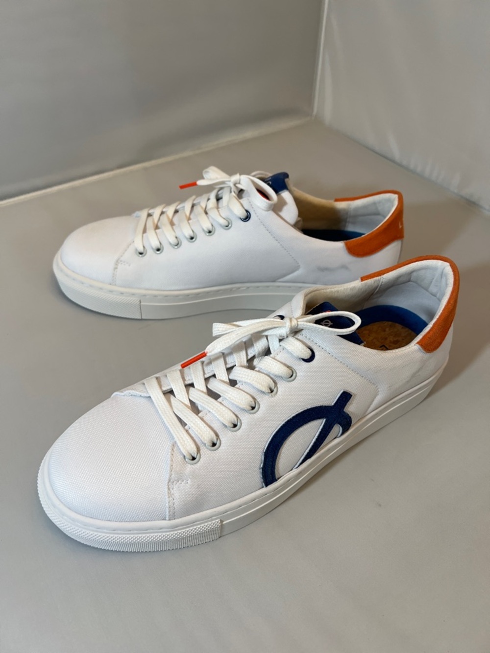 LOCI White Casual Sneakers with Navy Icon and Orange Heel